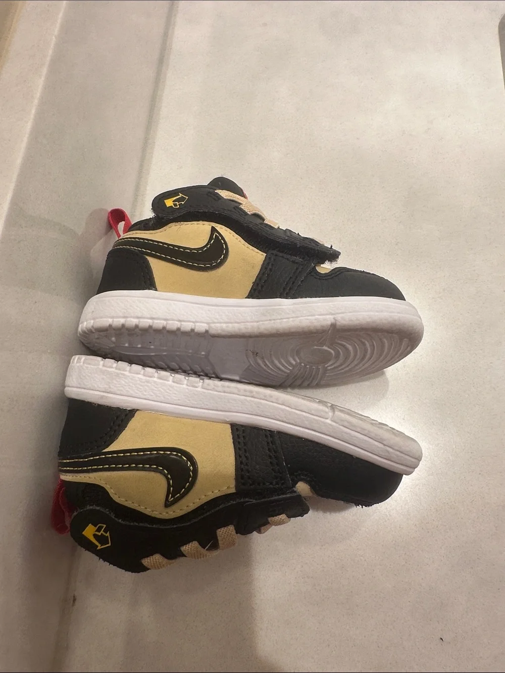 Jordan Kids Low-Top Sneakers in Black, Beige and Red Accents